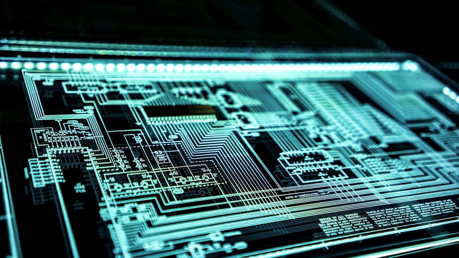 A circuit rendered in lit teal lines