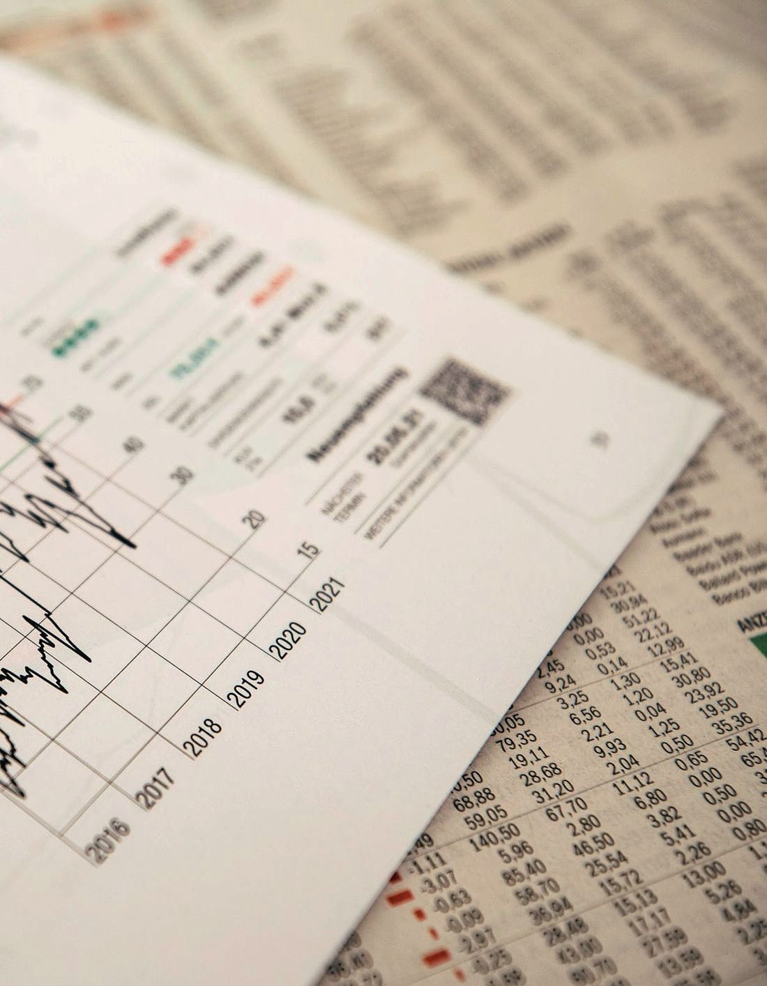 A printed report with a line chart plotted across the page