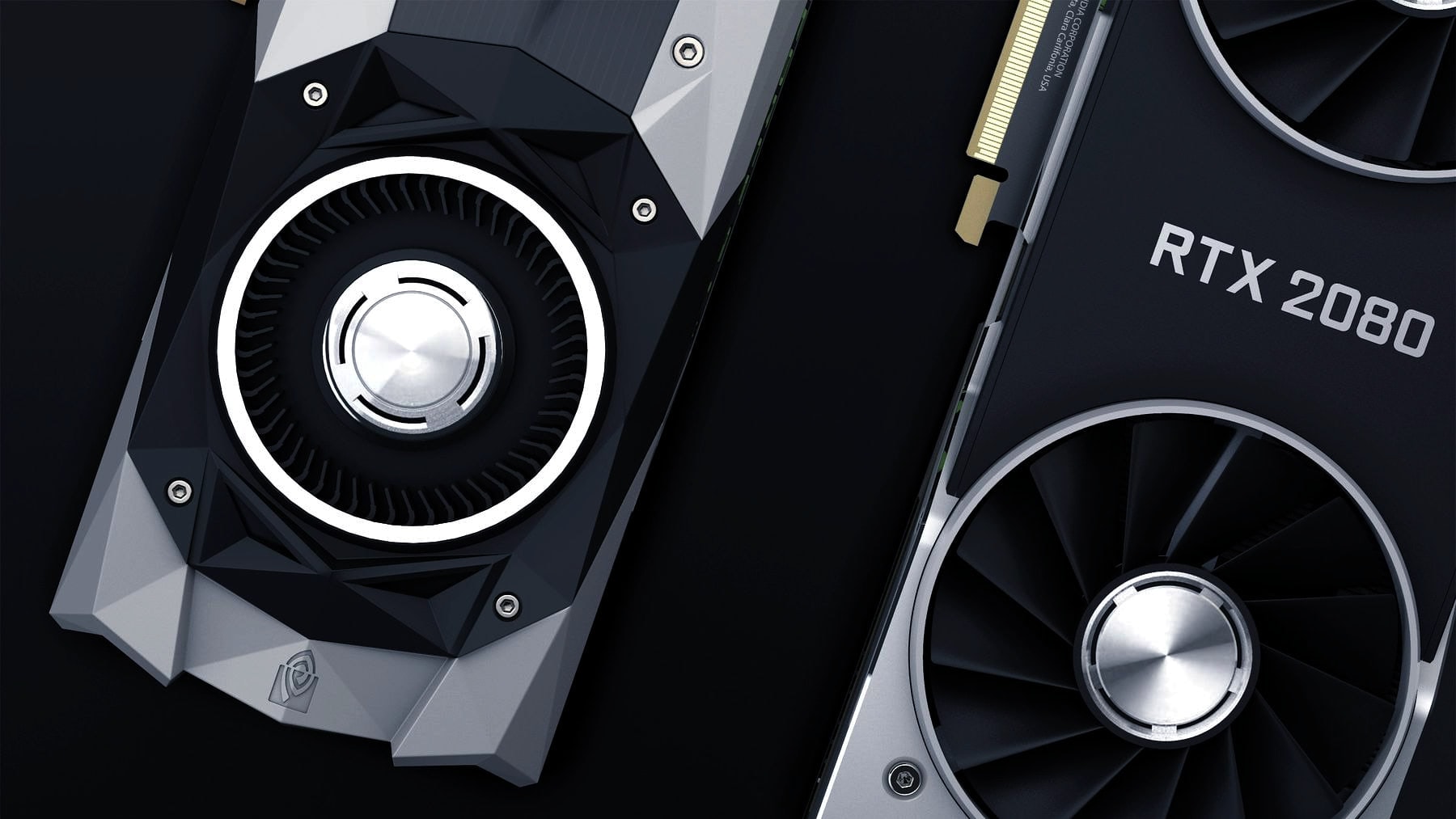 A graphics card photographed against black, fans forward